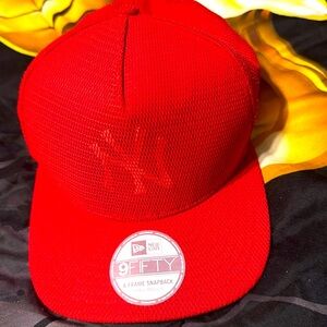 Red and white New York Yankees hat
